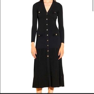 Black knit ribbed back dress with a flare